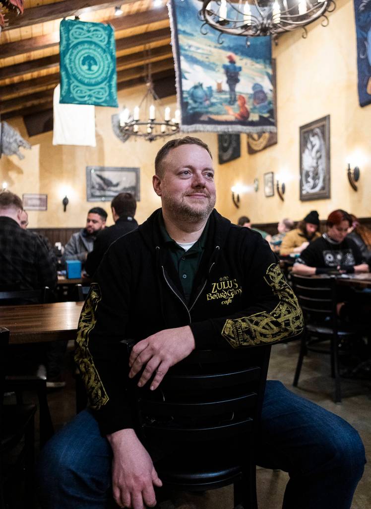 Zulu’s Board Game Cafe owner Matt Zaremba inside his location in Bothell on Friday, Jan. 9, 2026. (Olivia Vanni / The Herald)