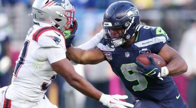 Seahawks running back Kenneth Walker III (9) will sign with the Kansas City Chiefs, according to The Athletic. (Getty Images / The Athletic)