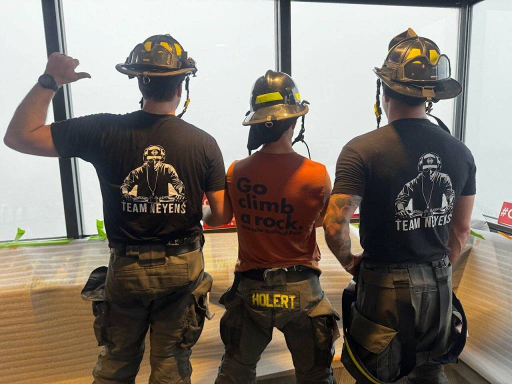 Everett Firefighters look out into the fog over Seattle, Washington from the Columbia Tower Sky View Observatory on March, 8 2026. (Photo courtesy of the Everett Fire Department)