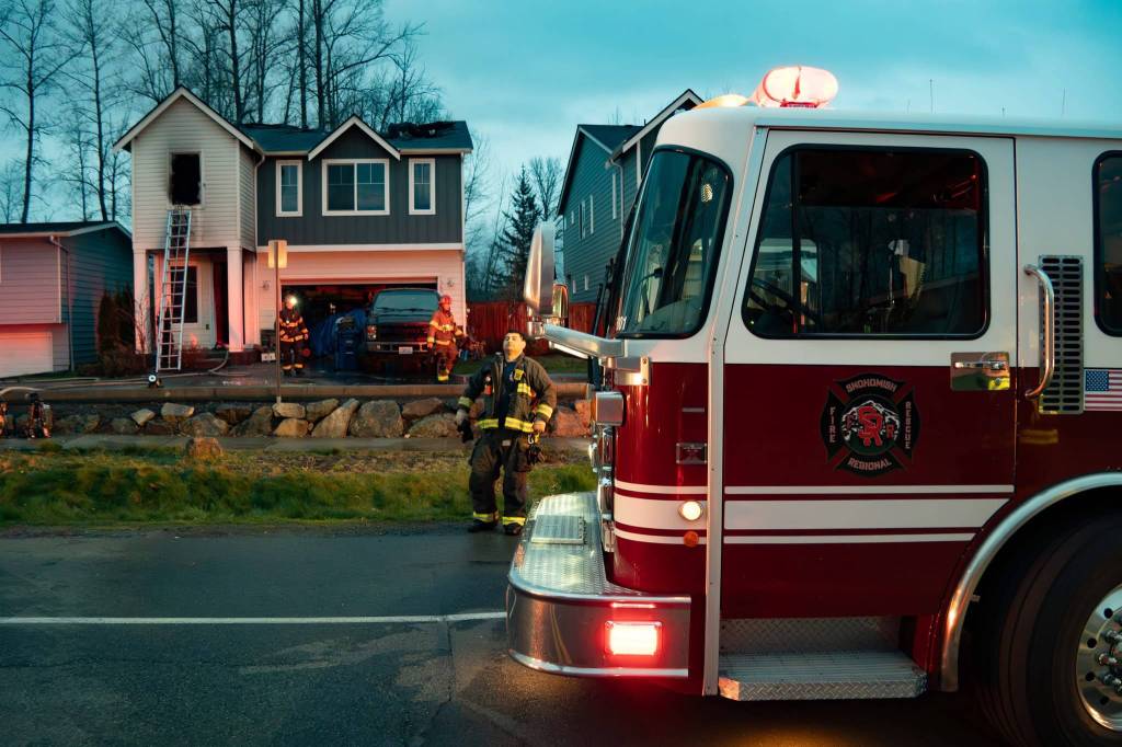 Fire crews responded to a house fire Wednesday that began rapidly spreading at the back of the home in Monroe. (Snohomish Regional Fire & Rescue)