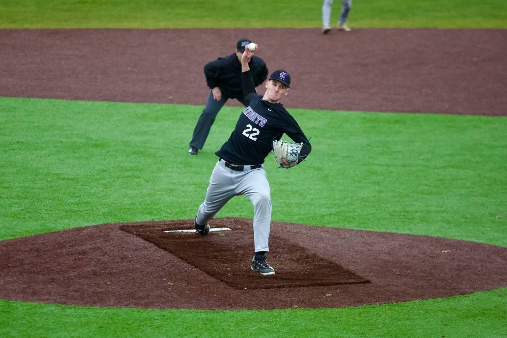 Kamiak senior Cole Armstrong-Hoss delivers a pitch during the Knights 6-5 loss to Snohomish at Geiger Field on March 11, 2026. (Joe Pohoryles / The Herald)