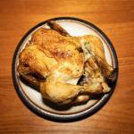 A garlic & herb rotisserie chicken sits on a plate on Tuesday, Jan. 6, 2026 in Edmonds, Washington. (Olivia Vanni / The Herald)