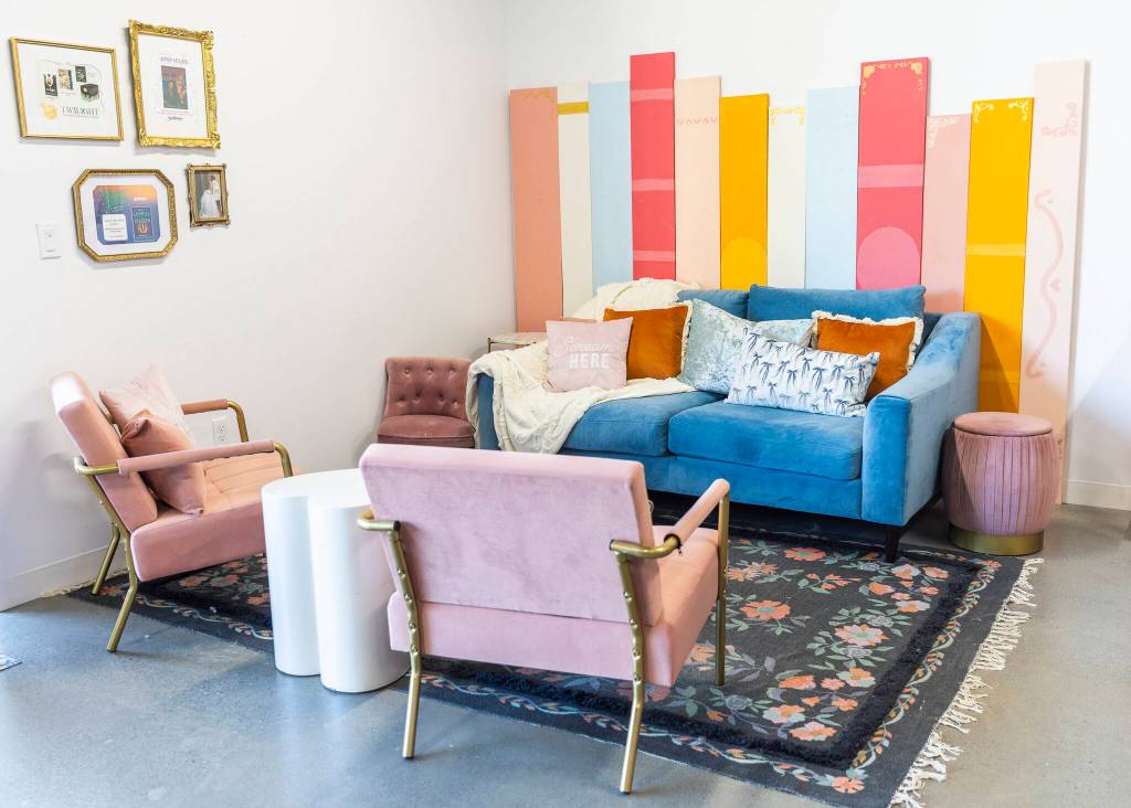 A lounge and reading area available to customers and used for book club at Hardcovers Romance Bookstore on Tuesday, July 8, 2025 in Mill Creek, Washington. (Olivia Vanni / The Herald)