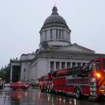 A fire truck outside the Washington state Capitol on the evening of March 12, after a fire alarm went off in the final stretch of the 2026 legislative session. (Photo by Bill Lucia/Washington State Standard)