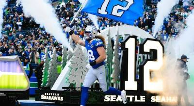 Seahawks fullback Brady Russell (38) runs out of the Lumen Field tunnel in Seattle, Washington prior to a game against the Minnesota Vikings on Nov. 30, 2025. (Photo courtesy of Edwin Hooper / Seattle Seahawks)