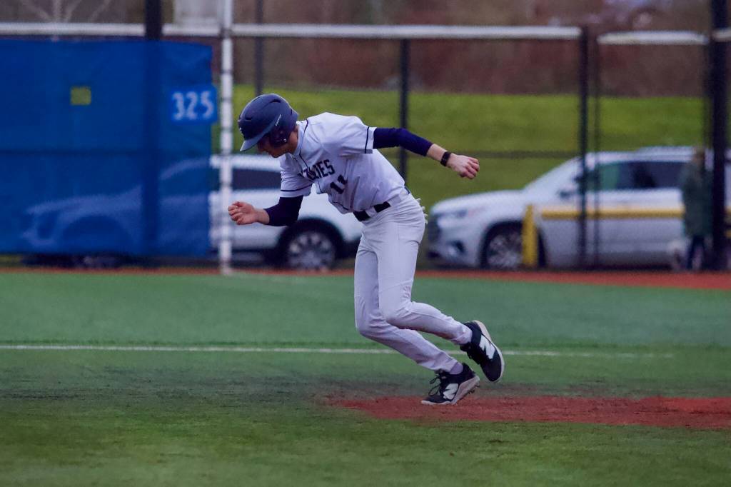 Glacier Peak senior JW Grose runs to second base during the Grizzlies 6-2 win against Shorewood at Meridian Park Field on March 16, 2026. (Joe Pohoryles / The Herald)