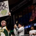A Seattle Sonics fan holds a sign before the Rain City Showcase in a preseason NBA game between the LA Clippers and the Utah Jazz at Climate Pledge Arena on October 10, 2023 in Seattle, Washington. (Steph Chambers / Getty Images / The Athletic)
