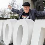 GeekFest showrunner, Nathan Mumm, outside of the Lynnwood Event Center where the event will be held this July on Tuesday, March 17, 2026 in Lynnwood, Washington. (Olivia Vanni / The Herald)