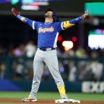 Eugenio Suárez (7) of Team Venezuela reacts after hitting a RBI double in the ninth inning of the 2026 World Baseball Classic Championship game between Team Venezuela and Team USA at loanDepot Park on Tuesday in Miami, Florida. (Getty Images / The Athletic)