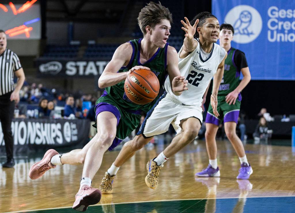 Edmonds-Woodway’s DJ Karl drives to the hoop during the 3A state quarterfinal game against Bellarmine Prep on Thursday, March 5, 2026 in Tacoma, Washington. (Olivia Vanni / The Herald)