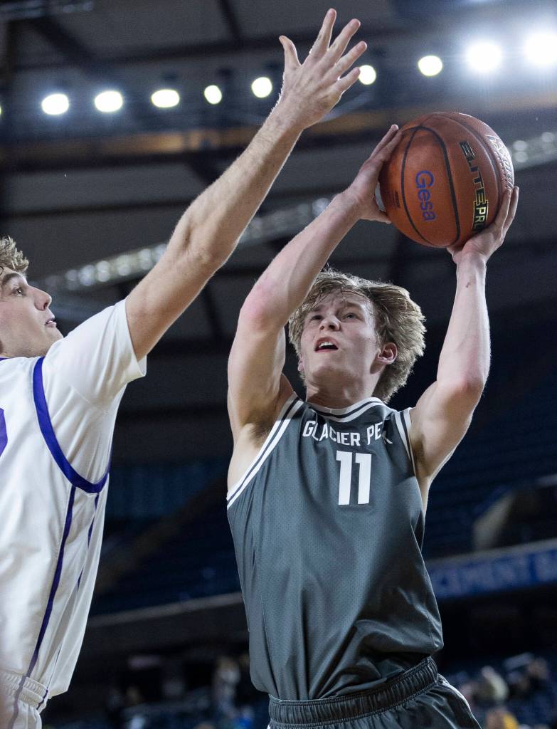 Glacier Peak’s Reed Nagel attempts a layup during the 4A state quarterfinal game against Lake Washington on Thursday, March 5, 2026 in Tacoma. (Olivia Vanni / The Herald)