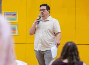 John Glennon, executive director of hunger prevention services for Volunteers of America Western Washington, speaks during a listening session with on Gov. Bob Ferguson and Rep. Rick Larsen on Aug. 21 in Lynnwood. (Olivia Vanni / The Herald)