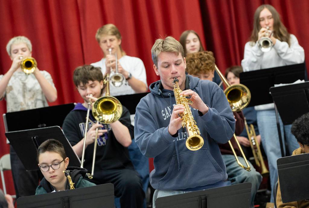 Mountlake Terrace High School senior Owen Smith plays a soprano saxophone during a band workshop with trombonist Francisco Torres on Monday, March 30, 2026 in Mountlake Terrace, Washington. (Olivia Vanni / The Herald)