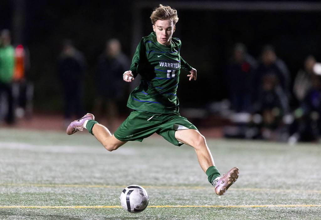 Edmonds-Woodways Mason Clark takes a shot on goal during the game against Archbishop Murphy on Tuesday, March 31, 2026 in Edmonds, Washington. (Olivia Vanni / The Herald)