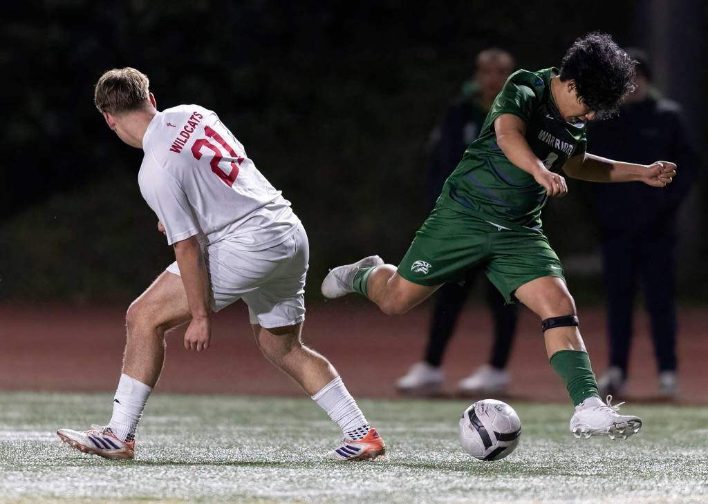 Archbishop Murphys Carter Ward tries to take the ball away from Edmonds-Woodways Kekoa Wake while he takes the ball up the field during the game on Tuesday, March 31, 2026 in Edmonds, Washington. (Olivia Vanni / The Herald)