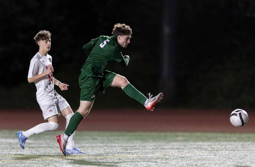Edmonds-Woodways Liam Milstead takes a shot on goal during the game against Archbishop Murphy on Tuesday, March 31, 2026 in Edmonds, Washington. (Olivia Vanni / The Herald)