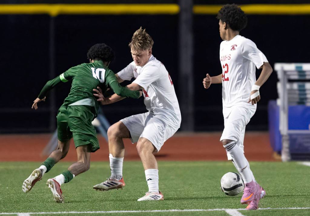Archbishop Murphys Carter Ward pushes Edmonds-Woodways Natan Ghebreamlak while trying to defend during the game on Tuesday, March 31, 2026 in Edmonds, Washington. (Olivia Vanni / The Herald)