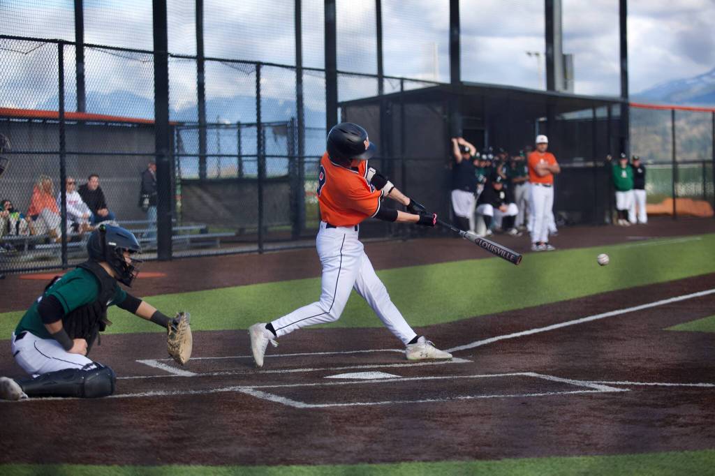 Monroe senior Alec Nitzel makes contact during the Bearcats 5-3 loss to Jackson at Monroe High School on April 3, 2026. (Joe Pohoryles / The Herald)