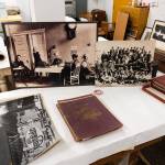 Photos and memorabilia lie in the bottom floor of the Everett Museum of Historys new location on Friday, April 10, 2026 in Everett, Washington. (Will Geschke / The Herald)