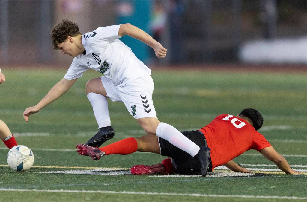 Snohomishs Isidro Lopez Moreno slide tackles Jacksons Ivan Tsurkanov during the game on Monday, April 6, 2026 in Snohomish, Washington. (Olivia Vanni / The Herald)
