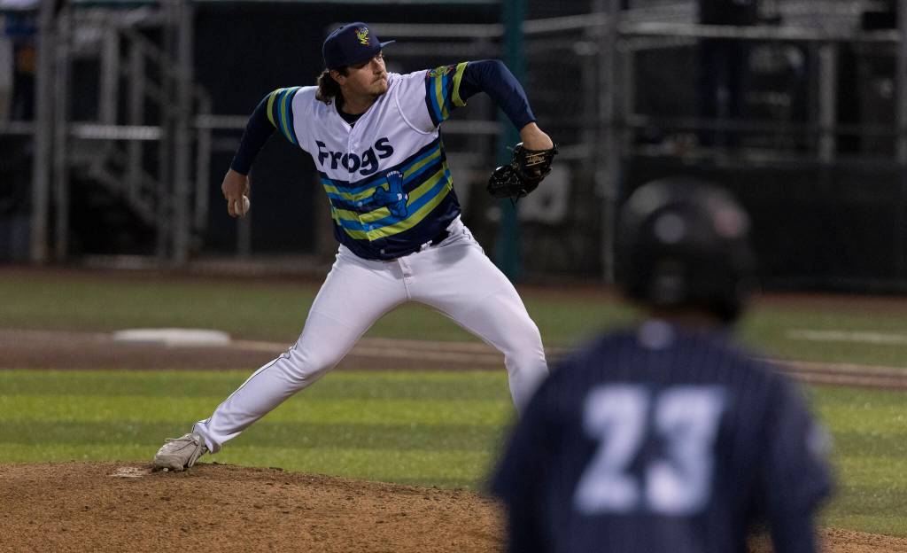 Wyatt Lunsford-Shenkman (46) of the Everett AquaSox pitches with the bases loaded against the Tri-City Dust Devils on Tuesday, April 7, 2026 in Everett, Washington. (Olivia Vanni / The Herald)