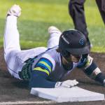 Josh Caron (10) of the Everett AquaSox safely slides into third base for a triple during the game against the Tri-City Dust Devils on Tuesday, April 7, 2026 in Everett, Washington. (Olivia Vanni / The Herald)