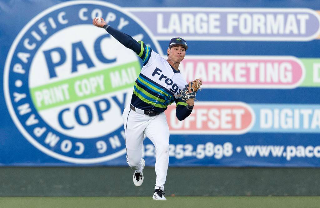 Jonny Farmelo (15) of the Everett AquaSox throws in a ball from the outfield during the game against the Tri-City Dust Devils on Tuesday, April 7, 2026 in Everett, Washington. (Olivia Vanni / The Herald)