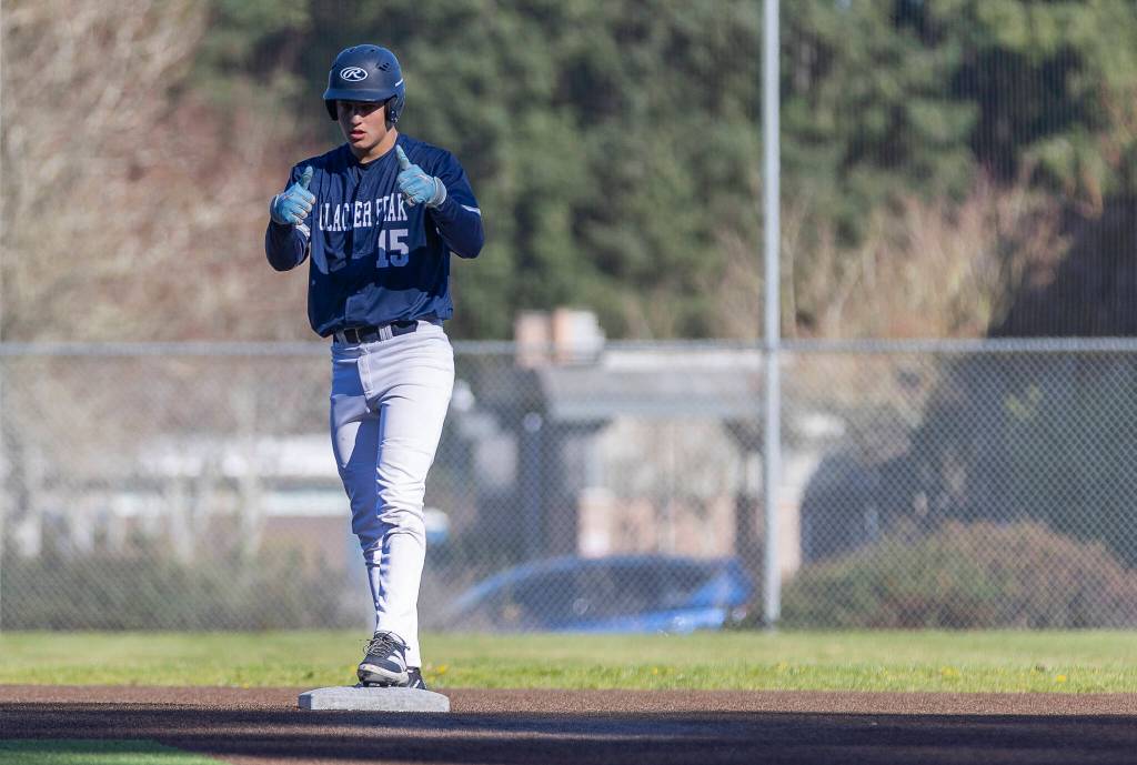 Glacier Peaks Lucas Keller reacts to making it to second base during the game against Meadowdale on Wednesday, April 8, 2026 in Lynnwood, Washington. (Olivia Vanni / The Herald)