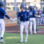 Glacier Peaks Matthew Marquardt high-fives Glacier Peaks Emmett Brown after scoring during the game against Meadowdale on Wednesday, April 8, 2026 in Lynnwood, Washington. (Olivia Vanni / The Herald)