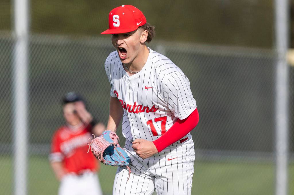 Stanwoods Ryan Hansen reacts after getting an out with bases loaded to end the inning during the game against Mountlake Terrace on Wednesday, April 15, 2026 in Stanwood, Washington. (Olivia Vanni / The Herald)