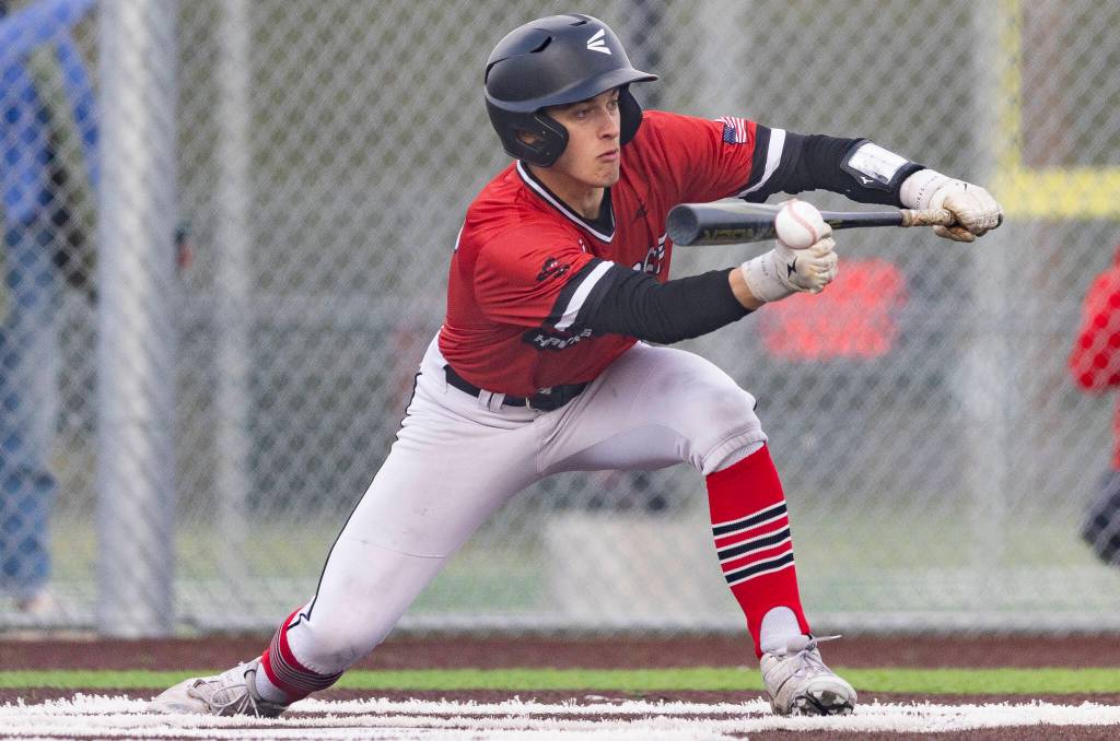 Mountlake Terraces Nicholas Liepins bunts during the game against Stanwood on Wednesday, April 15, 2026 in Stanwood, Washington. (Olivia Vanni / The Herald)