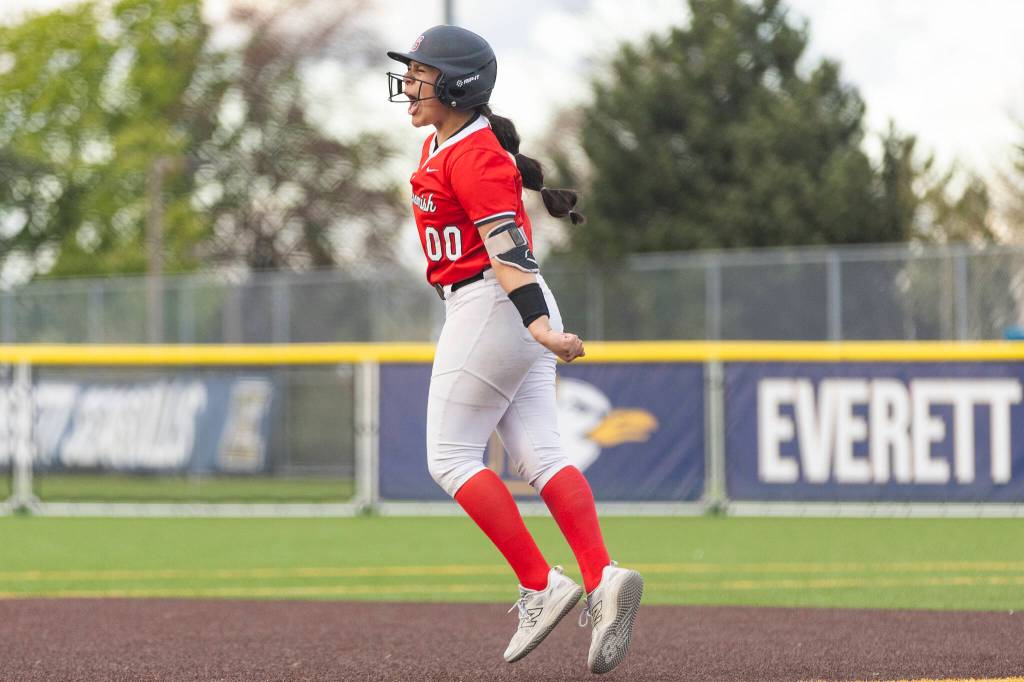 Snohomishs Amelie Lopez reacts after hitting a home run during the game against Everett on Thursday, April 16, 2026 in Everett, Washington. (Olivia Vanni / The Herald)