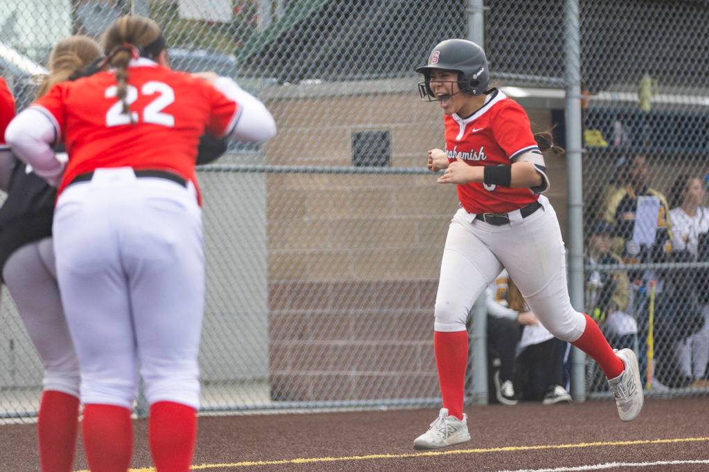 Snohomishs Amelie Lopez reacts after hitting a home run during the game against Everett on Thursday, April 16, 2026 in Everett, Washington. (Olivia Vanni / The Herald)