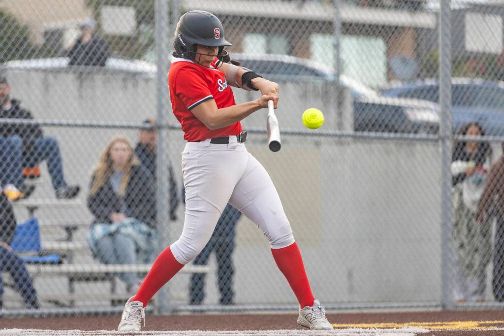 Snohomishs Amelie Lopez hits a home run during the game against Everett on Thursday, April 16, 2026 in Everett, Washington. (Olivia Vanni / The Herald)