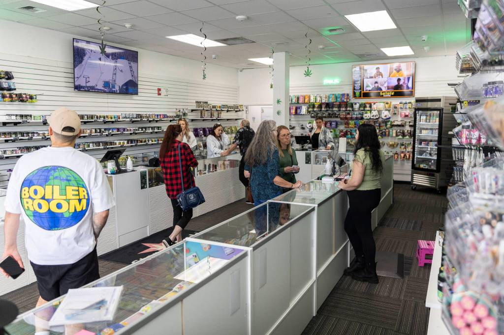 Customers shop inside of Starbuds on Monday, April 20, 2026 in Lynnwood, Washington. (Olivia Vanni / The Herald)