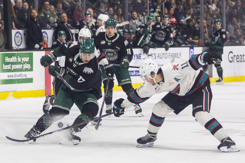 Tij Iginla #11 of the Kelowna Rockets knocks the puck away from Julius Miettinen #17 of the Everett Silvertips during Game 5 of the Western Hockey League second round on Friday, April 17, 2026 in Everett, Washington. (Olivia Vanni / The Herald)