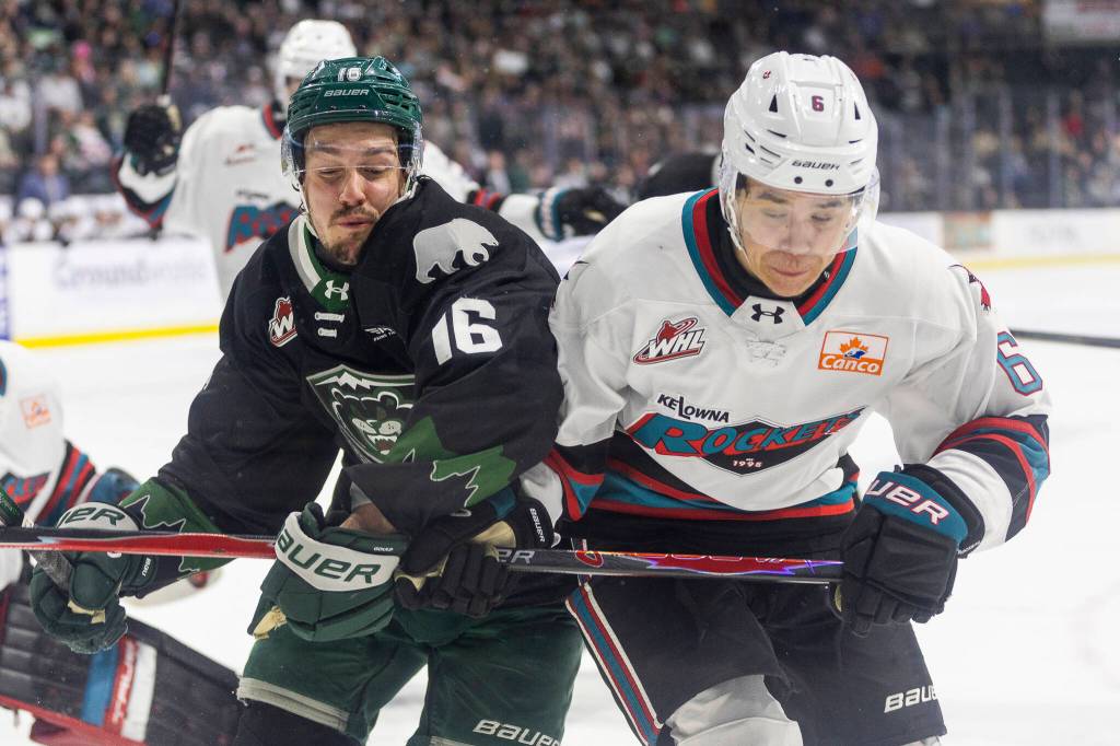 Rylan Gould #16 of the Everett Silvertips and Parker Alcos #6 of the Kelowna Rockets shove each other during Game 5 of the Western Hockey League second round on Friday, April 17, 2026 in Everett, Washington. (Olivia Vanni / The Herald)