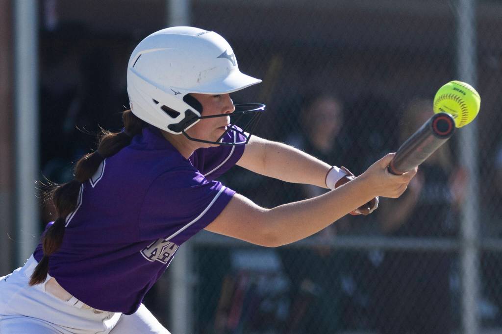 Kamiaks Cam Hansen bunts during the game against Jackson on Monday, April 20, 2026 in Mill Creek, Washington. (Olivia Vanni / The Herald)