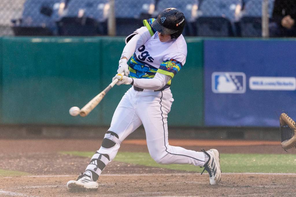 Jonny Farmelo #15 of the Everett AquaSox gets a hit during the game against the Spokane Indians on Tuesday, April 21, 2026 in Everett, Washington. (Olivia Vanni / The Herald)