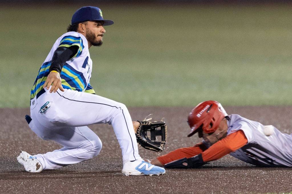 Axel Sanchez #21 of the Everett AquaSox catches a throw to second base for an out during the game against the Spokane Indians on Tuesday, April 21, 2026 in Everett, Washington. (Olivia Vanni / The Herald)