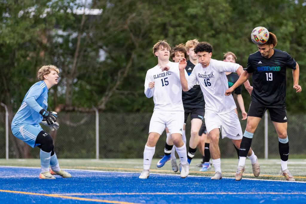 Shorewoods Tajidin Babayev heads the ball off a corner kick during the game against Glacier Peak on Tuesday, April 28, 2026 in Shoreline, Washington. (Olivia Vanni / The Herald)