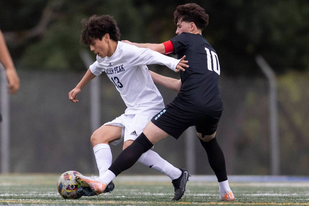 Glacier Peaks Nik Villasenor and Shorewoods Nikola Genadiev battle for the ball during the game on Tuesday, April 28, 2026 in Shoreline, Washington. (Olivia Vanni / The Herald)