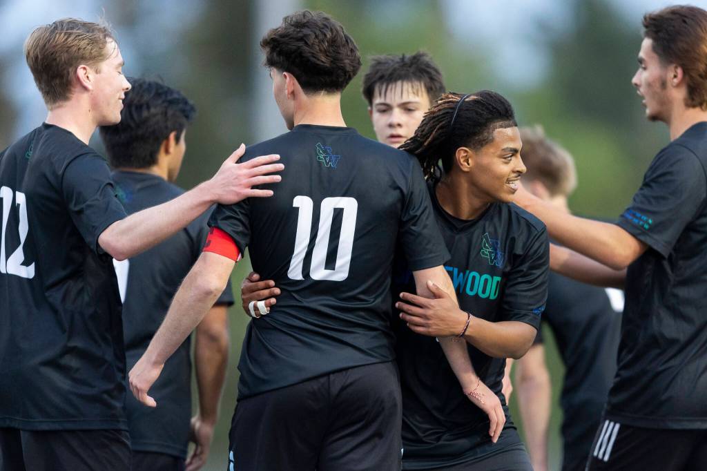 Shorewoods Meiron Bereket hugs Shorewoods Nikola Genadiev after he scores during the game against Glacier Peak on Tuesday, April 28, 2026 in Shoreline, Washington. (Olivia Vanni / The Herald)