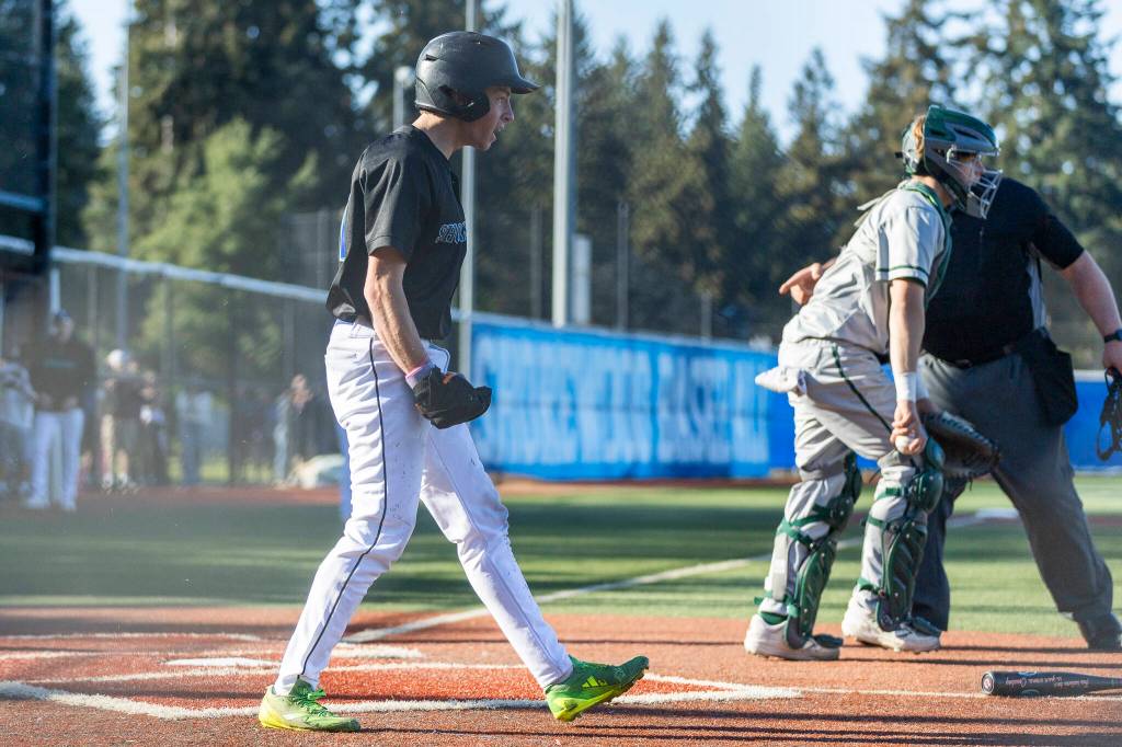 Shorewoods Cameron Falk reacts after scoring during the game against Edmonds-Woodway on Wednesday, April 29, 2026 in Shoreline, Washington. (Olivia Vanni / The Herald)