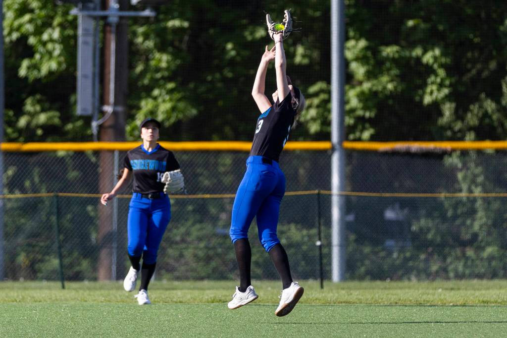 Shorewoods Maddie Schilperoort makes a catch in the outfield during the game against Meadowdale on Thursday, April 30, 2026 in Lynnwood, Washington. (Olivia Vanni / The Herald)