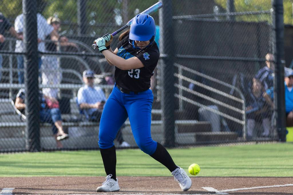 Shorewoods Grace McLaughlin is hit by a pitch during the game against Meadowdale on Thursday, April 30, 2026 in Lynnwood, Washington. (Olivia Vanni / The Herald)