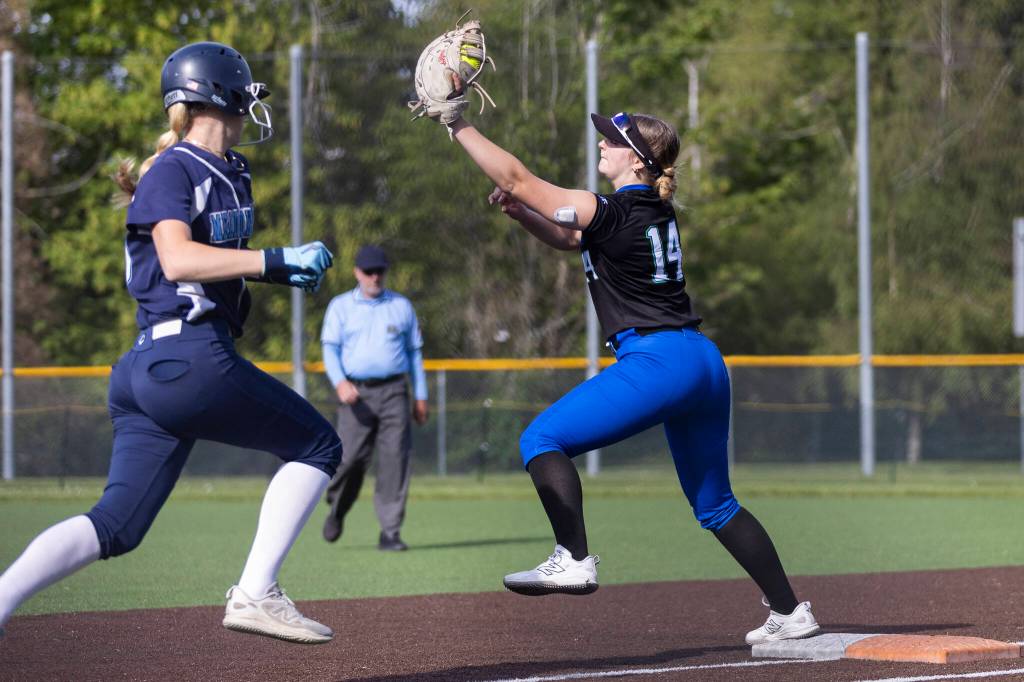 Shorewoods Rose Gallagher makes a catch for an out at first base during the game against Meadowdale on Thursday, April 30, 2026 in Lynnwood, Washington. (Olivia Vanni / The Herald)