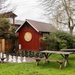 An outside picnic area and chess set at Bayview Corner on Thursday, March 12, 2026 in Langley, Washington. (Olivia Vanni / The Herald)