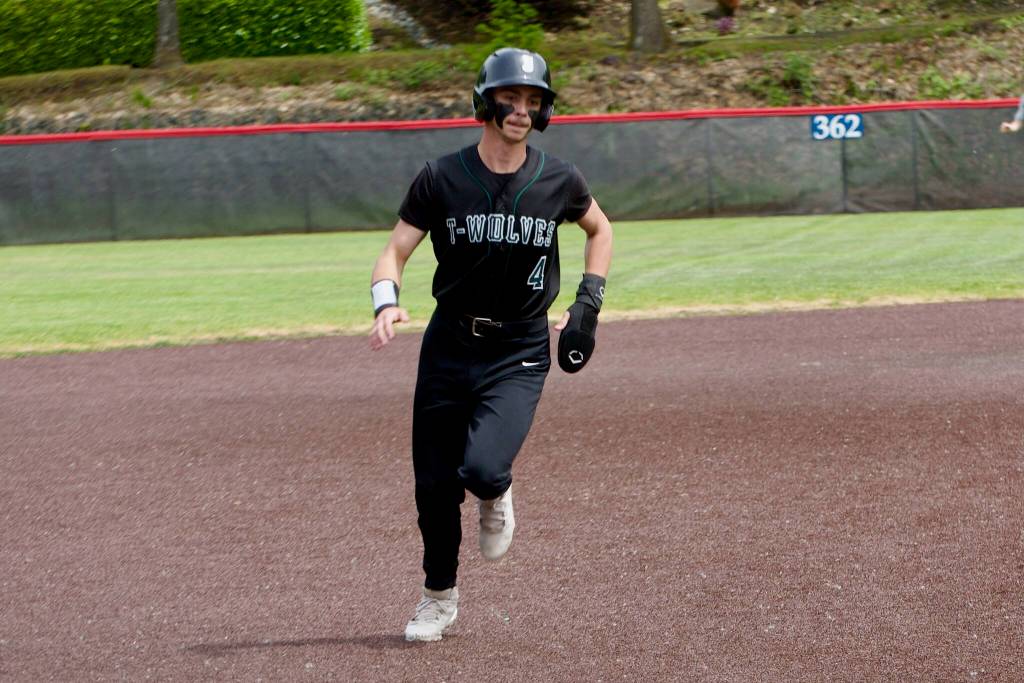 Noah Langsea runs to third base during Jacksons baseball game against Woodinville at Bannerwood Park in Bellevue, Washington on Saturday, May 8, 2026. (Aaron Coe / The Herald)