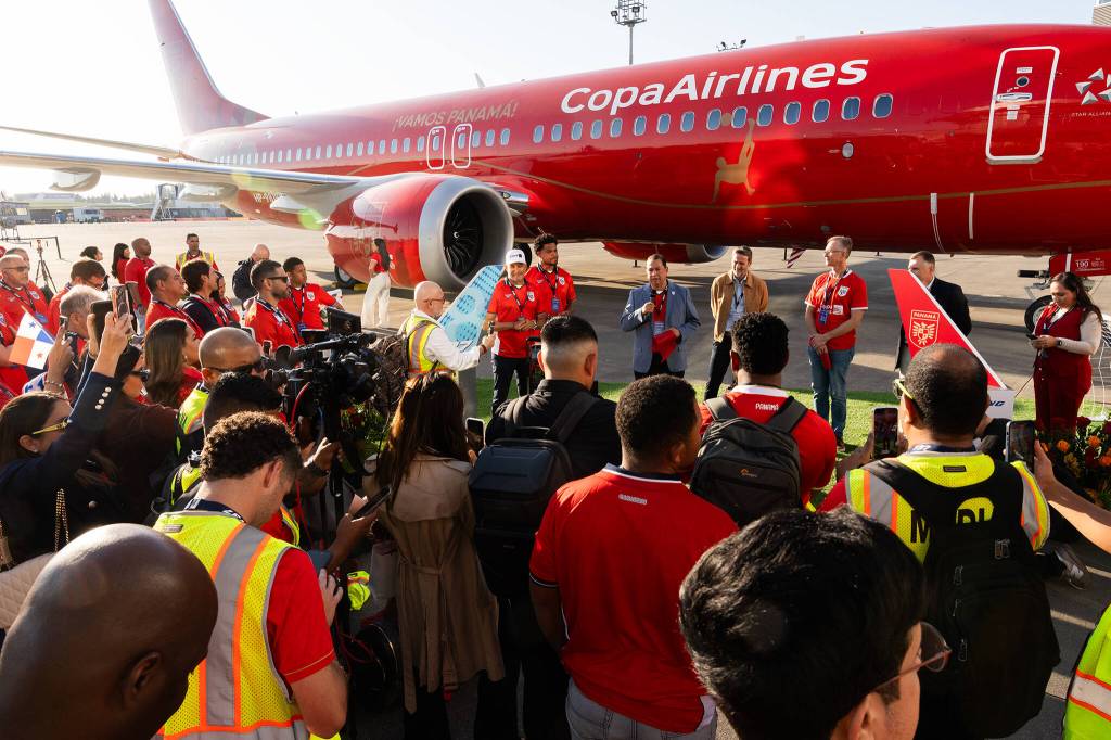Attendees look at the new airplane livery for the Panama national soccer team ahead of the 2026 FIFA World Cup on Tuesday, May 5, 2026 in Everett, Washington. (Will Geschke / The Herald)